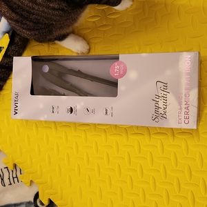 Ceramic flat iron for hair.